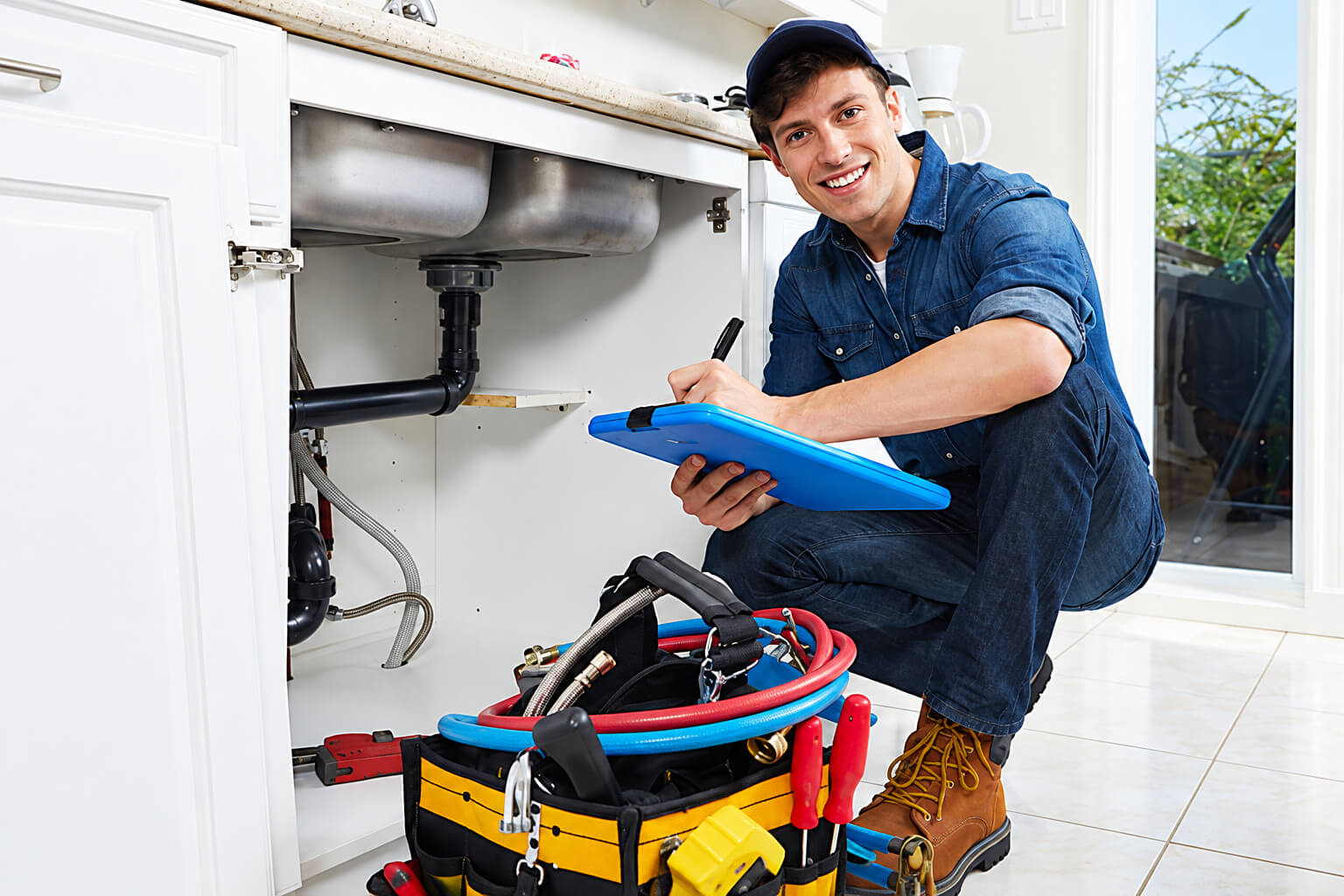 Plumber providing home service